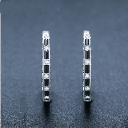 Black women's zircon earrings with geometric copper design, perfect for elegant and casual looks.