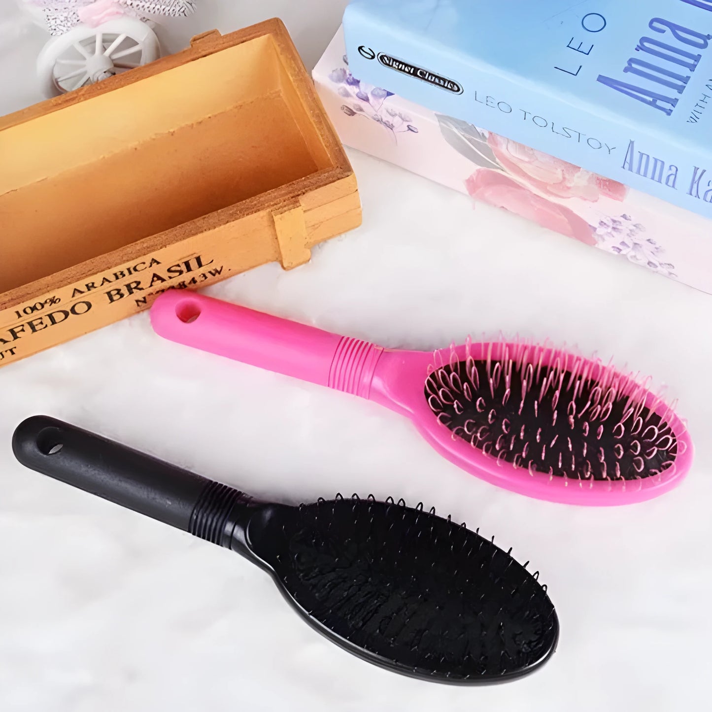 Black ring tooth hair extension comb with airbag design showing 22cm length