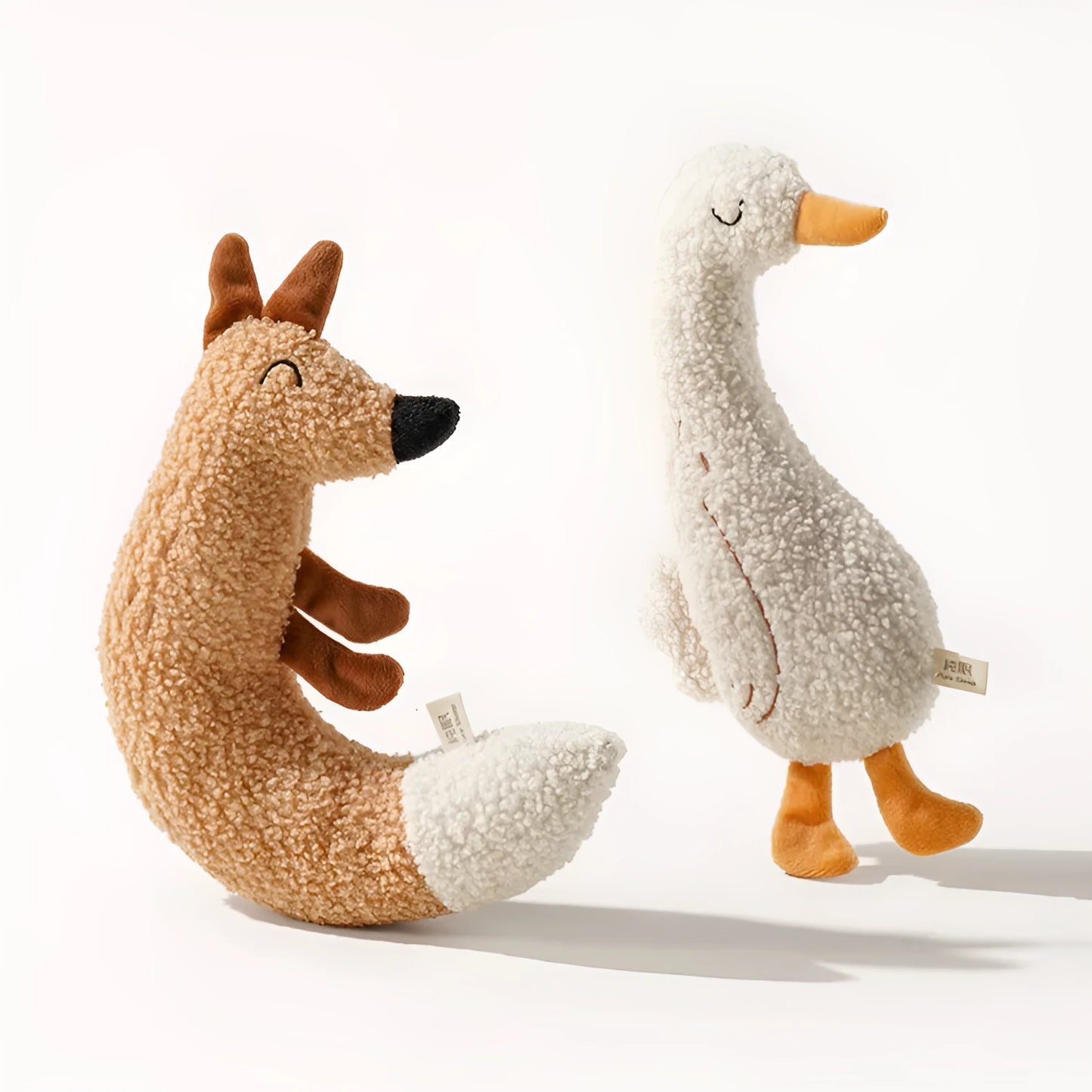 Fox and duckling plush pet chew toys made from soft teddy velvet fabric.