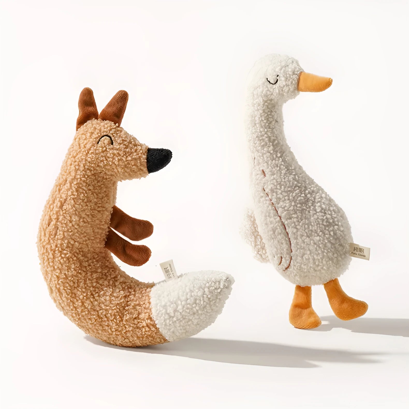 Fox and duckling plush pet chew toys made from soft teddy velvet fabric.