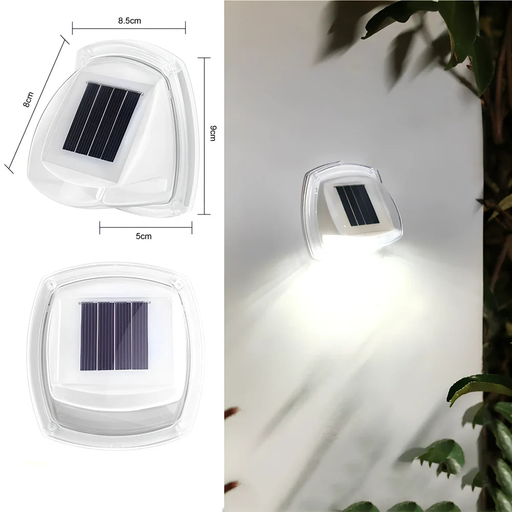 Solar garden wall lamp with waterproof housing mounted on brick wall