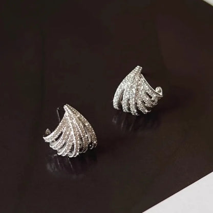 Geometric line design earrings with platinum electroplating on zircon, showing symmetrical patterns and clean architectural lines