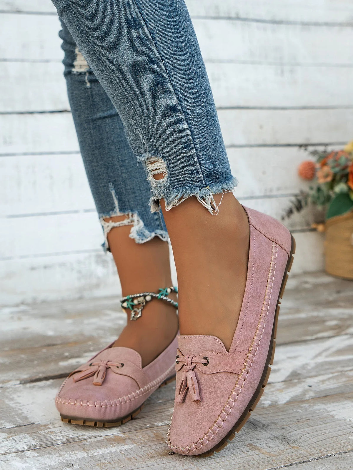 Women's casual suede flat shoes with decorative bow and round toe in apricot colour