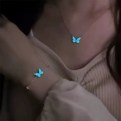 Glow-in-the-dark blue butterfly necklace and bracelet set for women, perfect for parties and gifts.