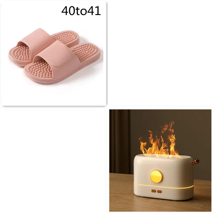 Black USB flame humidifier diffuser with 200ml tank on desktop showing simulation flame effect
