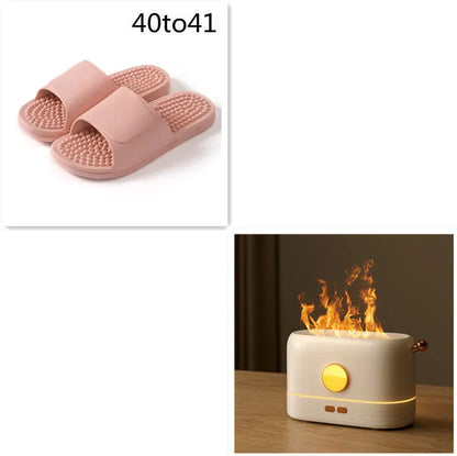 Black USB flame humidifier diffuser with 200ml tank on desktop showing simulation flame effect