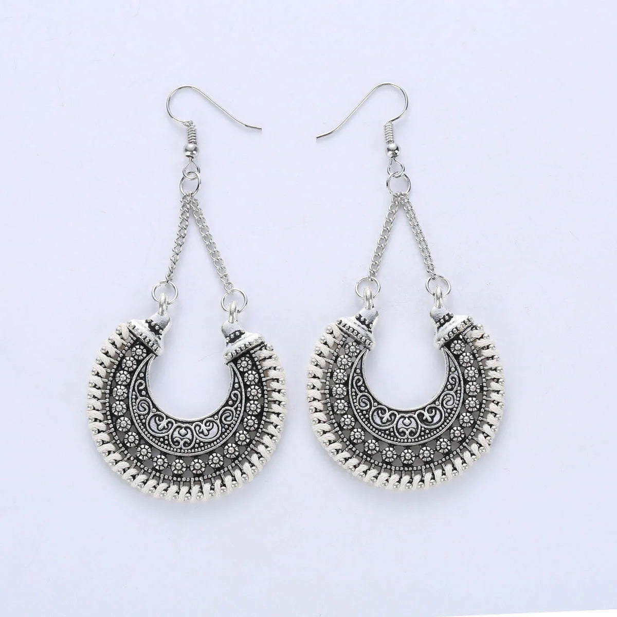 Bohemian Vintage Hand-Woven Rope Earrings with hollow-carved meniscus flower basket design