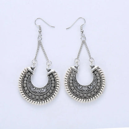 Bohemian Vintage Hand-Woven Rope Earrings with hollow-carved meniscus flower basket design