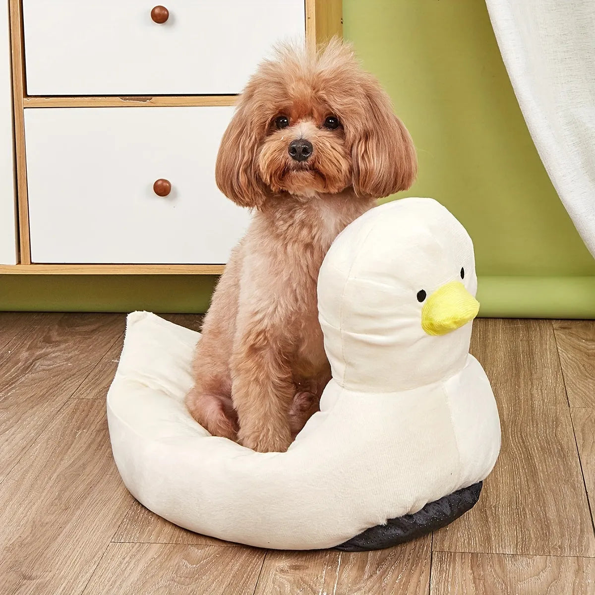 Blue duck shape fluffy pet bed sofa for small dogs and cats on a wooden floor