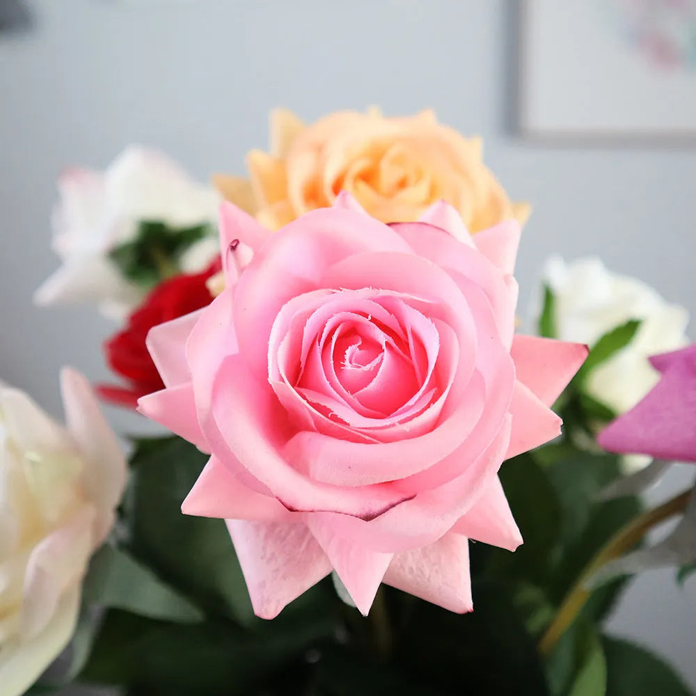 Artificial silk touch rose with fabric petals, approximately 42cm long, in a selection of colours