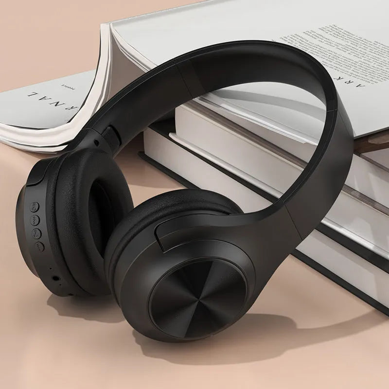 Wireless Bluetooth headset in chalk black colour showing head-mounted design with creative styling elements