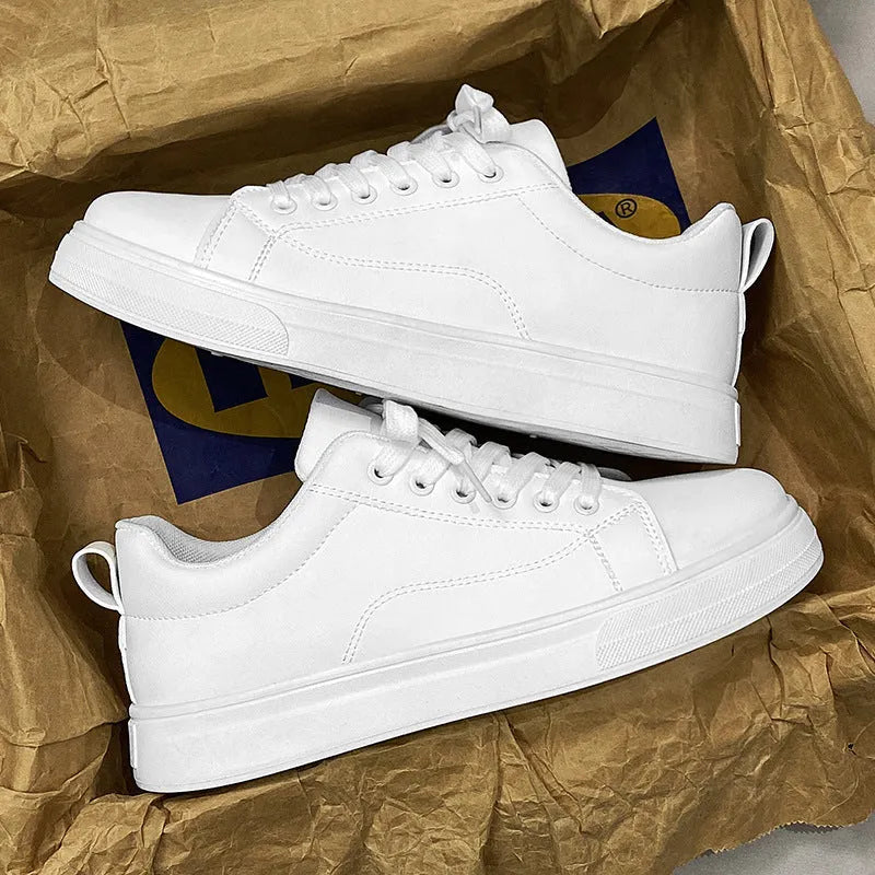 Men's low top casual sneakers in Korean style, shown in black, white, and two-tone colour options on a rubber sole.
