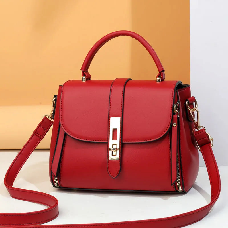 Women's soft black PU leather vertical messenger bag with adjustable strap, showing interior polyester lining.