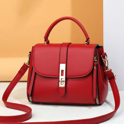 Women's soft black PU leather vertical messenger bag with adjustable strap, showing interior polyester lining.