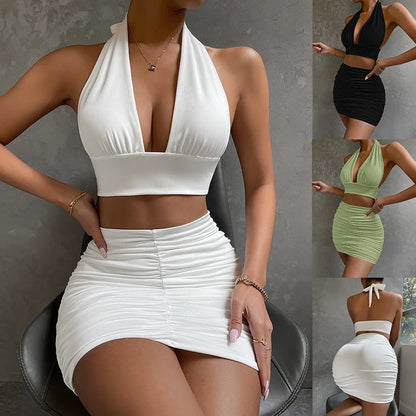 Stylish halter crop top with lace-up detail and pleated mini skirt set in various colors