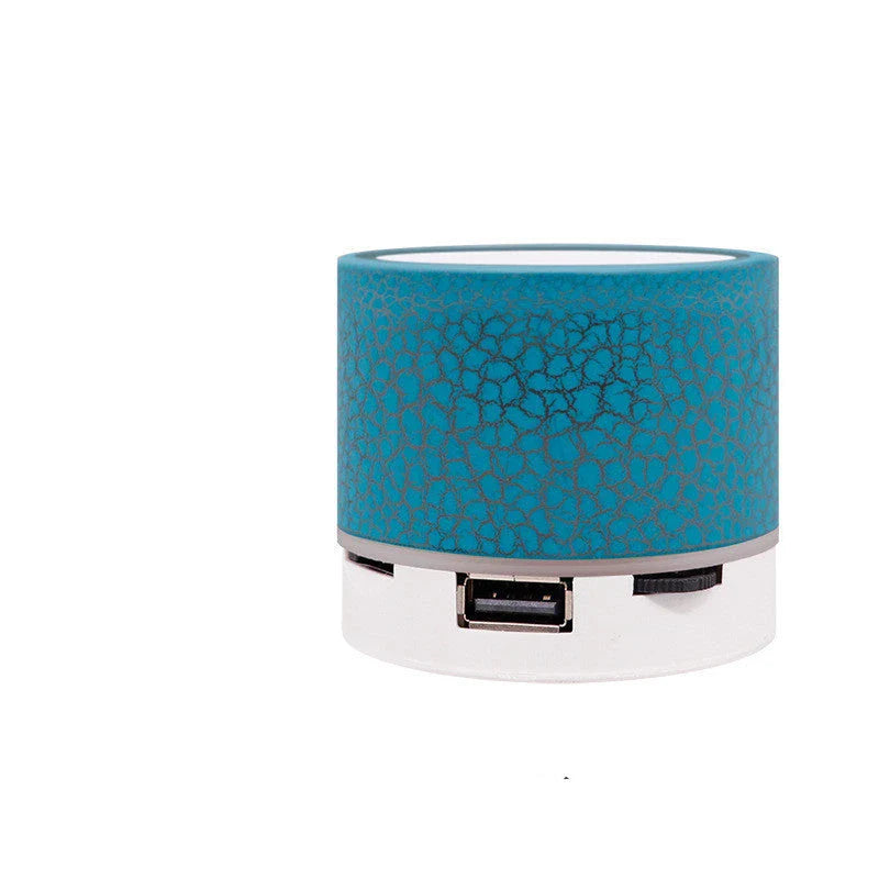 Portable Bluetooth speaker with colorful LED lights, offering impressive sound quality and convenient features for on-the-go music enjoyment.