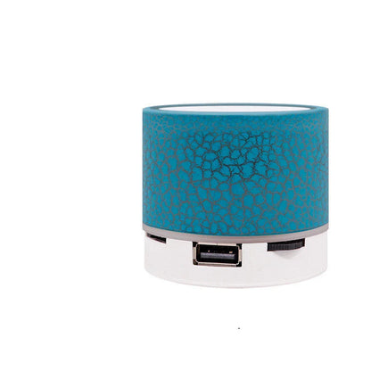 Portable Bluetooth speaker with colorful LED lights, offering impressive sound quality and convenient features for on-the-go music enjoyment.