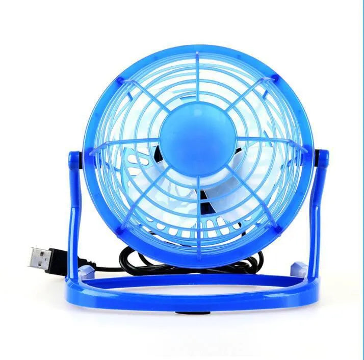 Black mini USB fan with adjustable angle mechanism and 96mm blades on desk