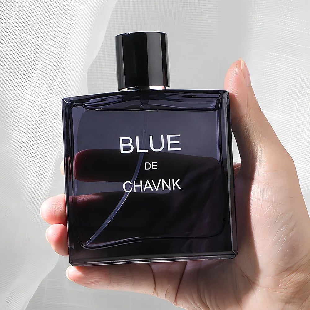 Men's woody citrus perfume bottle in black or blue, 100ml with spray, featuring sandalwood and cedar notes for lasting fragrance