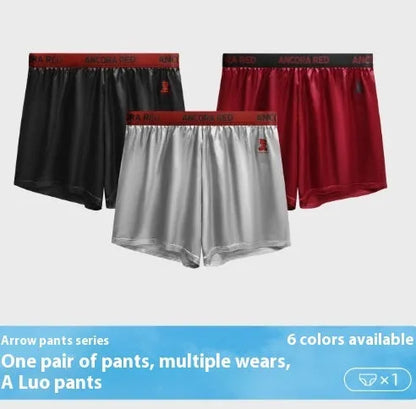 Solid colour men's polyester boxer briefs on a mid-waist, shown in black, red, blue, silver, purple, and brown.
