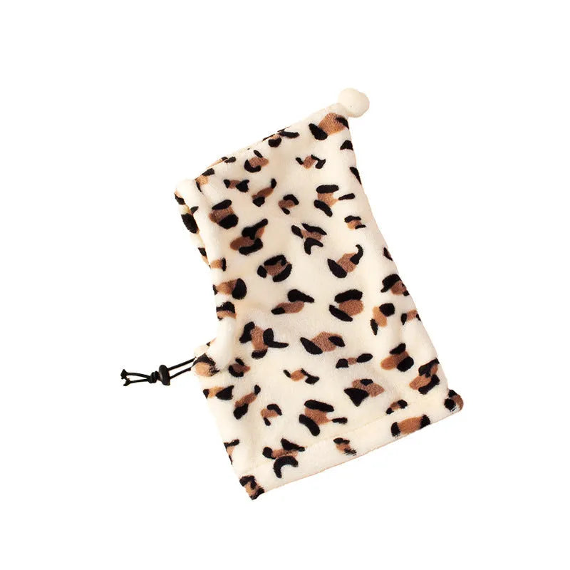 Cloth pet headgear with animal ears in leopard print, black, and red colours for dogs and cats