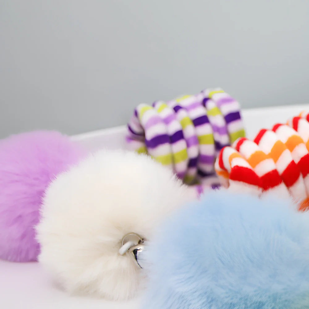 Blue interactive cat hanging toy with 8cm plush ball on 70cm stretchable wand attached via suction cup