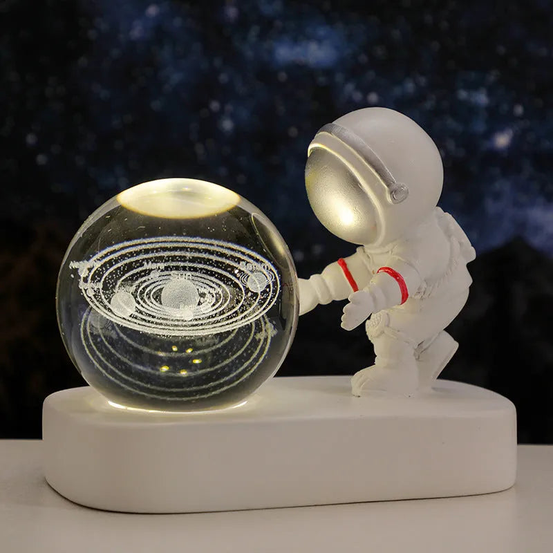 Astronaut crystal ball night light projecting galaxy pattern on 6cm resin sphere with USB cable