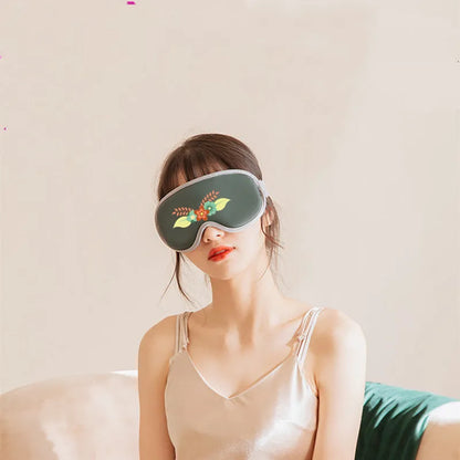 Portable eye SPA mask in pink or green with steam heating and vibration modes for relaxation