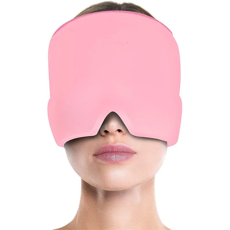 Black elastic cooling gel eye mask for headache relief placed on a forehead.