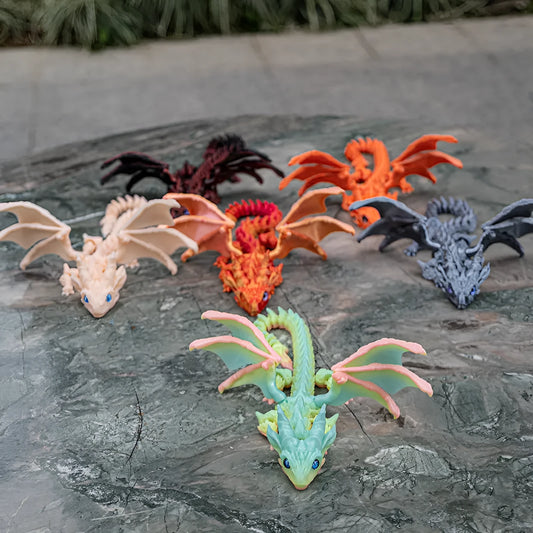 Red and gold 3D printed plastic dragon wings decoration for costumes.