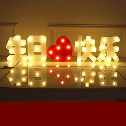 Plastic LED alphabet letter light spelling a message for a birthday or proposal.