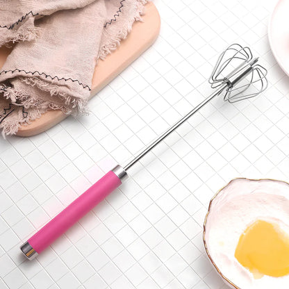 Self-spinning whisk with straight stainless steel design and black handle in multiple colours