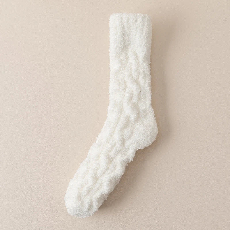 Cozy coral fleece socks in various colors, designed for superior comfort and warmth