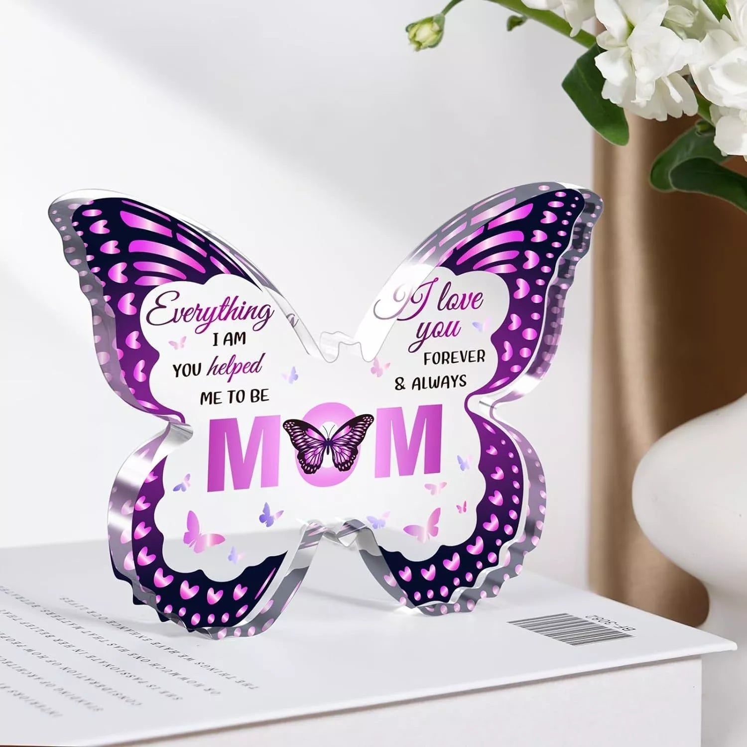 Butterfly-shaped acrylic keepsake with purple wing patterns and personalized message