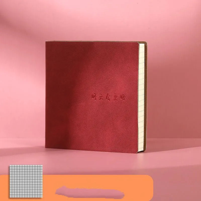 Square faux leather mesh cover notebook open on a blank Daolin paper page.
