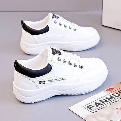 Women's white Korean-style lace-up pumps with a cross strap detail and a mid heel.