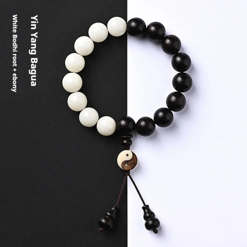 Handmade bodhi seed bracelet with eight-diagram pattern in white and blackwood beads