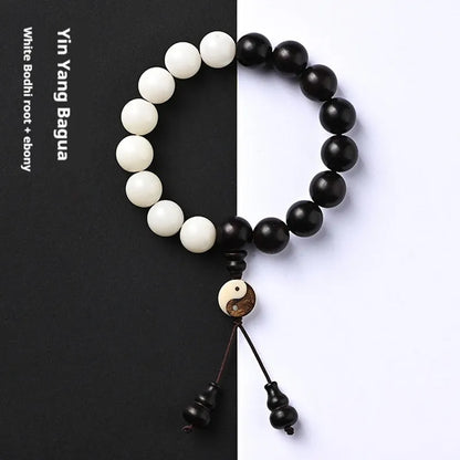 Handmade bodhi seed bracelet with eight-diagram pattern in white and blackwood beads
