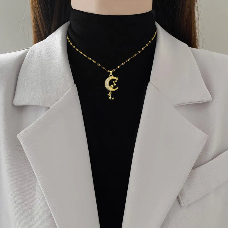 A218 stainless steel necklace with geometric moon pendant featuring copper detailing on an image style chain