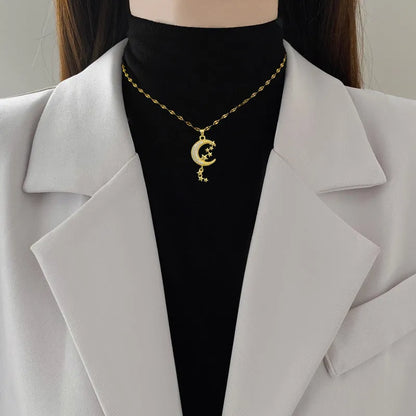 A218 stainless steel necklace with geometric moon pendant featuring copper detailing on an image style chain