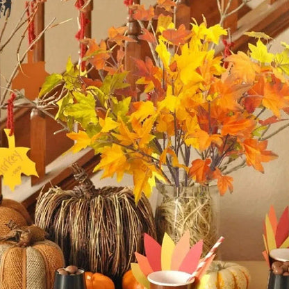 Four-colour maple leaf indoor flower decoration with autumn brown, orange, green, and yellow screen-printed leaves measuring 39cm tall