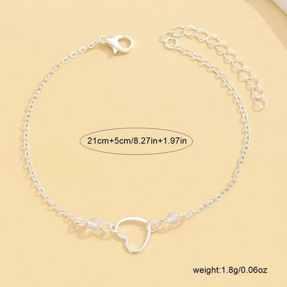 Women's adjustable heart anklet jewellery in gold or silver alloy with geometric design