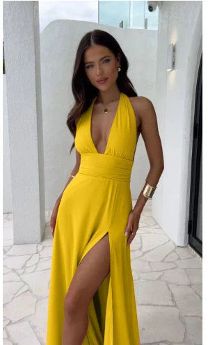Backless halter neck maxi dress in various colors, featuring a thigh-high slit and comfortable polyester fabric