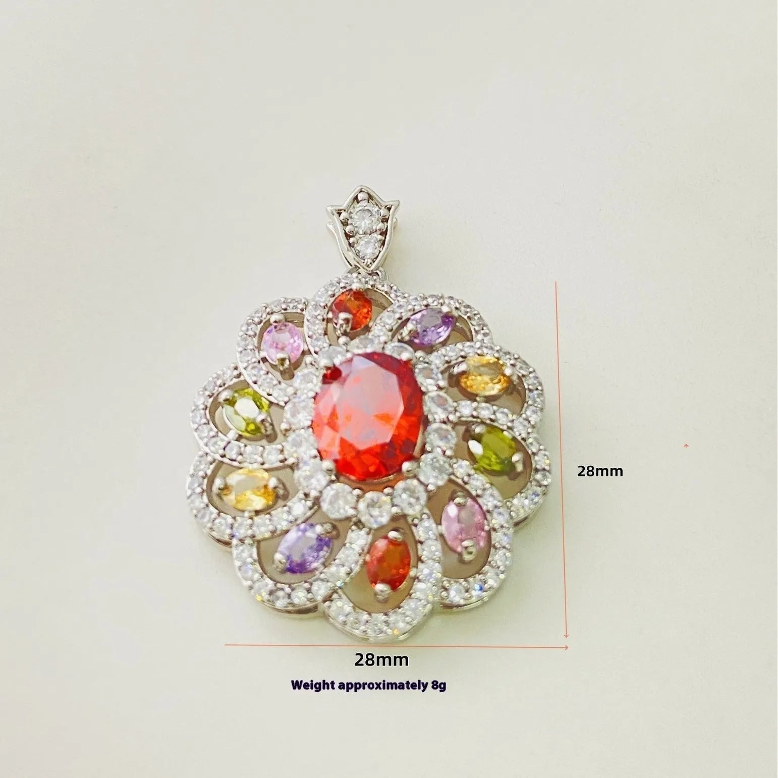 Close-up of a women's gold-coloured flower pendant necklace with a bright zircon stone centre.