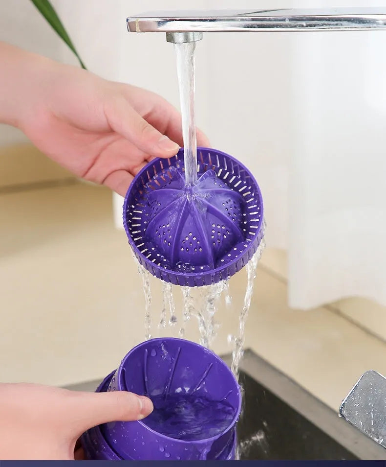 Purple USB rechargeable electric citrus juicer with detachable parts and charging cable.
