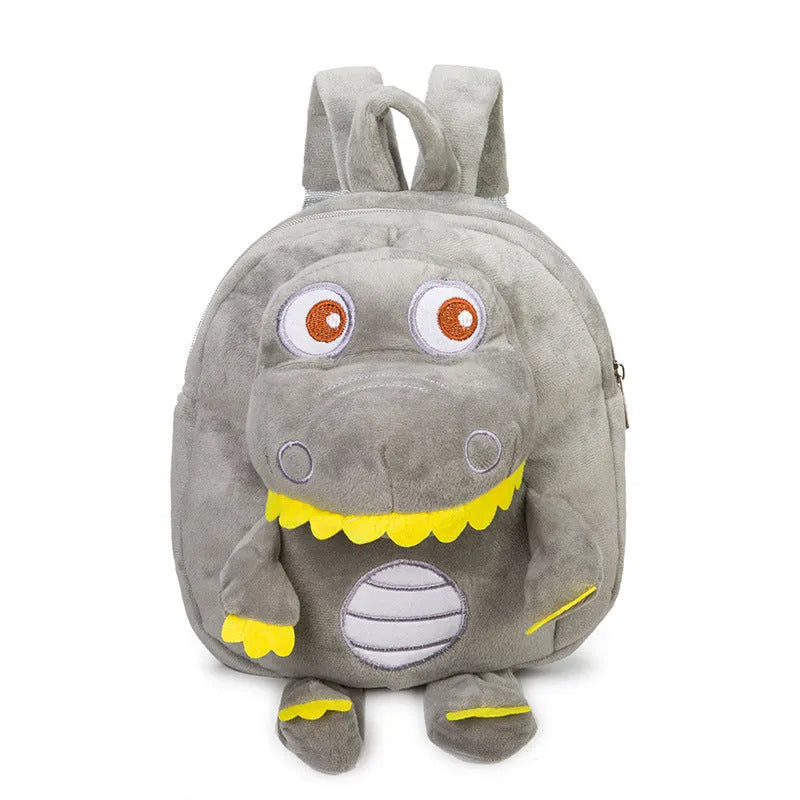 Soft blue dinosaur plush backpack with embroidery detail and a soft handle.