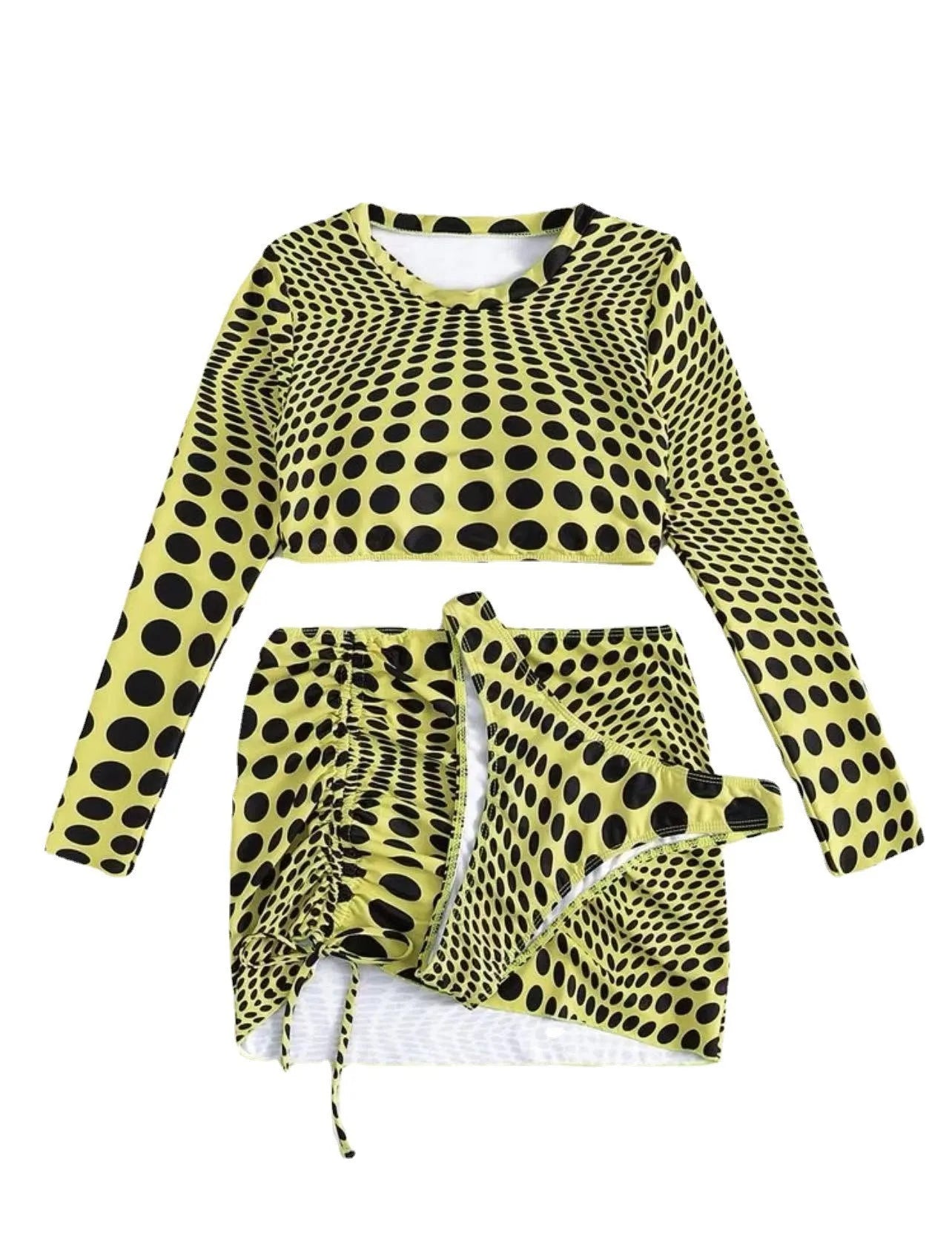 Green polka dot women's three-piece swimsuit set with top, skirt, and bra on hanger