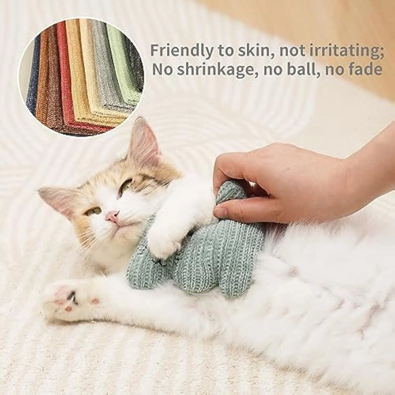 Catnip toy for cats and kittens featuring a knitted plush exterior with organic catnip filling and an internal bell, designed as a bite-resistant chew and teething toy measuring 12 cm by 11 cm in cyan or light coffee colour