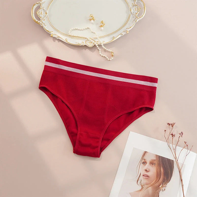 Breathable seamless women's underwear in black, gray, red, and skin color, offering comfort and style for plus-size figures.