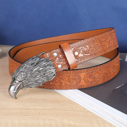 Men's brown imitation leather belt with an embossed alloy cow head pin buckle fastened on trousers.